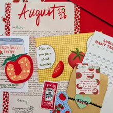 Load image into Gallery viewer, A styled flat-lay of a tomato-themed printable planner set, including an August 2026 recipe card, habit tracker, and other matching paper items, arranged on a white background with a red envelope.