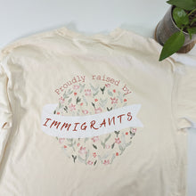 Load image into Gallery viewer, Proudly Raised by Immigrants Floral T-shirt
