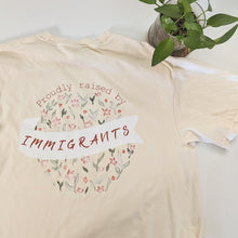 Load image into Gallery viewer, Proudly Raised by Immigrants Floral T-shirt
